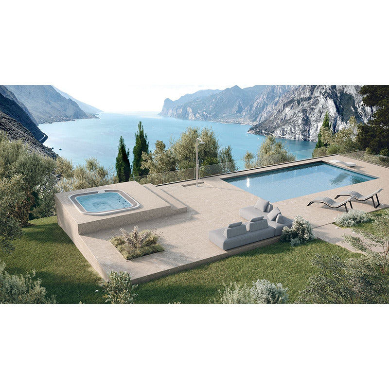 Exclusive outdoor area with Novellini Moon Hot tub, Pool area and lounge - Mediterranean landscape with lake view in a luxurious setting.